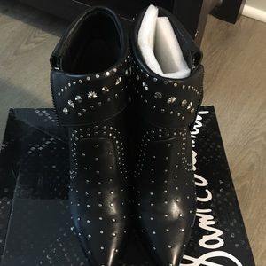 Women’s wedge studded boots.